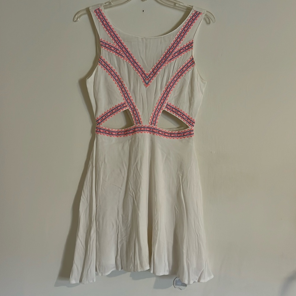 White cutout dress with embroidery